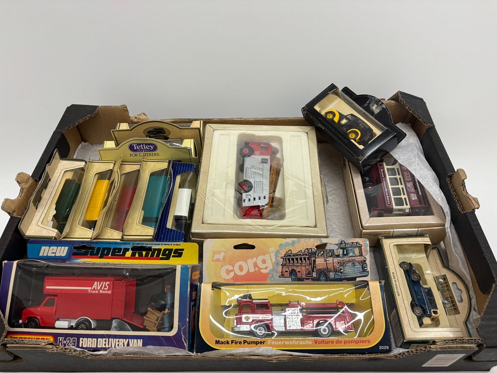 Lot 454: A Collection of Boxed Die-Cast Model Commercial and Fire Vehicles