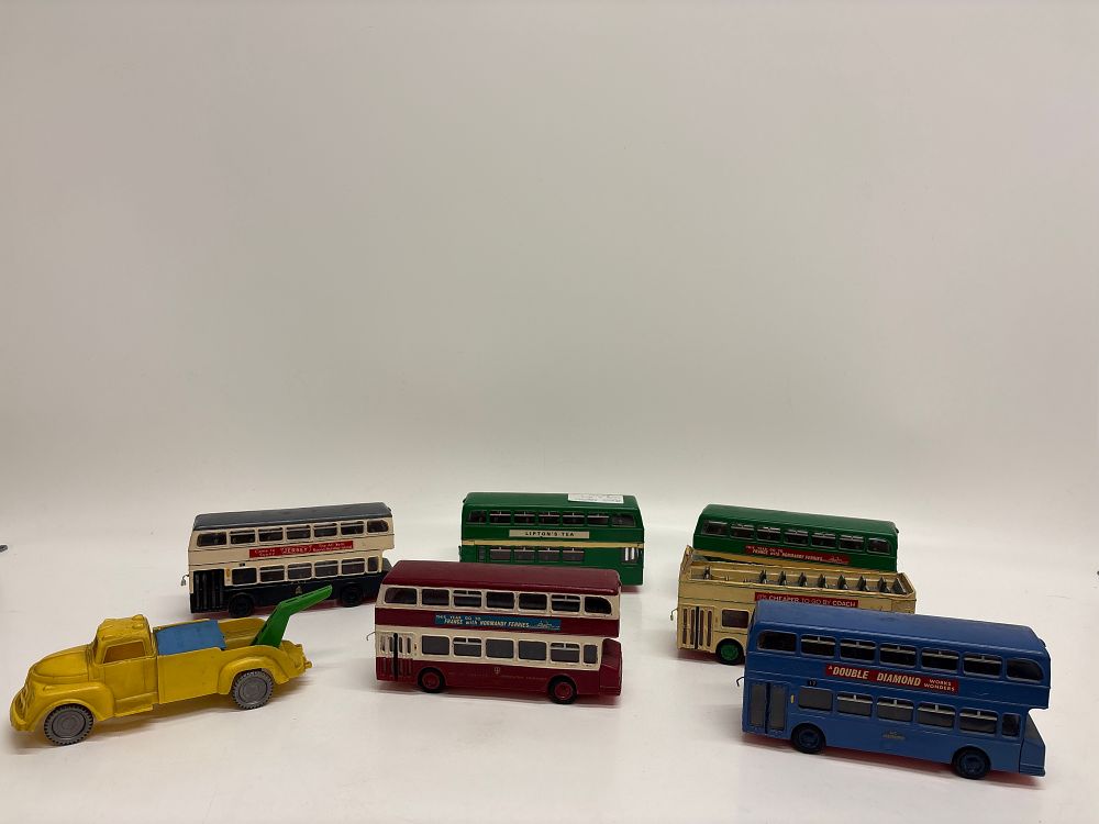 Lot 457: A Collection of Vintage British Plastic Friction Powered Double Decker Buses and a Recovery Truck