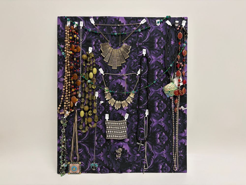 Lot 483: A Collection of Costume Jewellery Including Bib Necklaces, Pendants, and Brooch