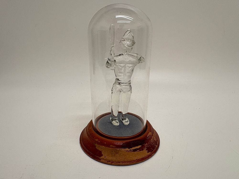 Lot 173: A British clear glass policeman figurine under a glass cloche