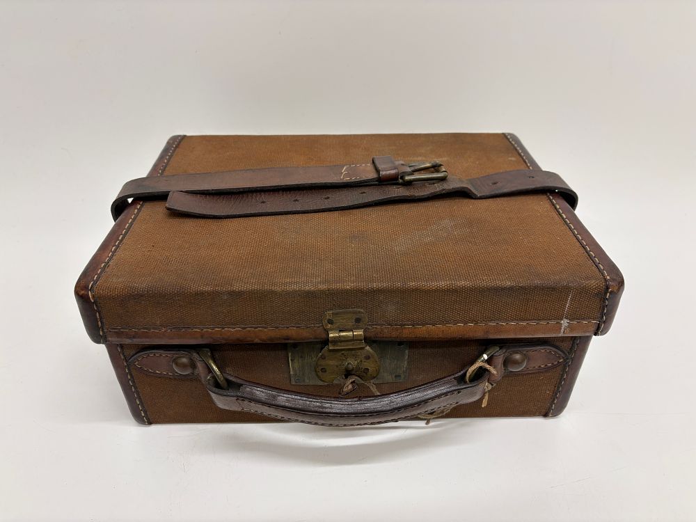 Lot 394: A Vintage Canvas and Leather Shotgun Cartridge Magazine