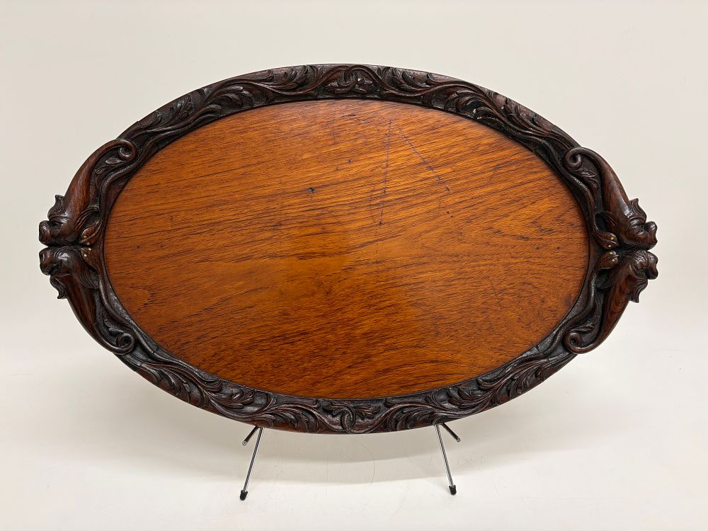 Lot 396: Late 19th Century Carved Oak Oval Serving Tray with Grotesque Mask Handles