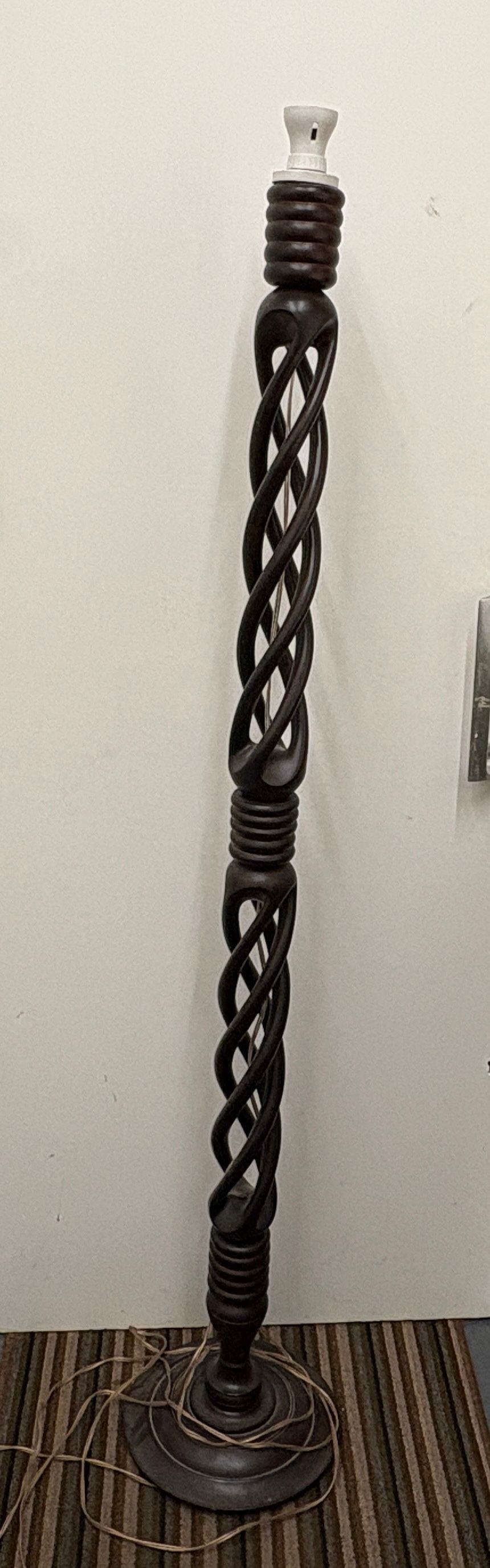 Lot 400: Hand-carved open twist hardwood floor lamp