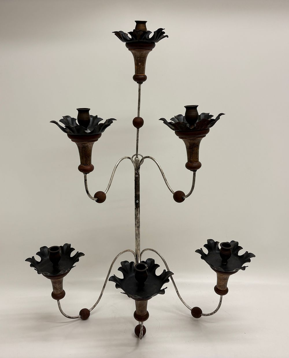 Lot 435: A large six-light wrought iron and wood candelabra
