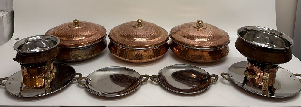 Lot 447: A Collection of La Coppera Tableware Hammered Copper and Stainless Steel Serving Pieces