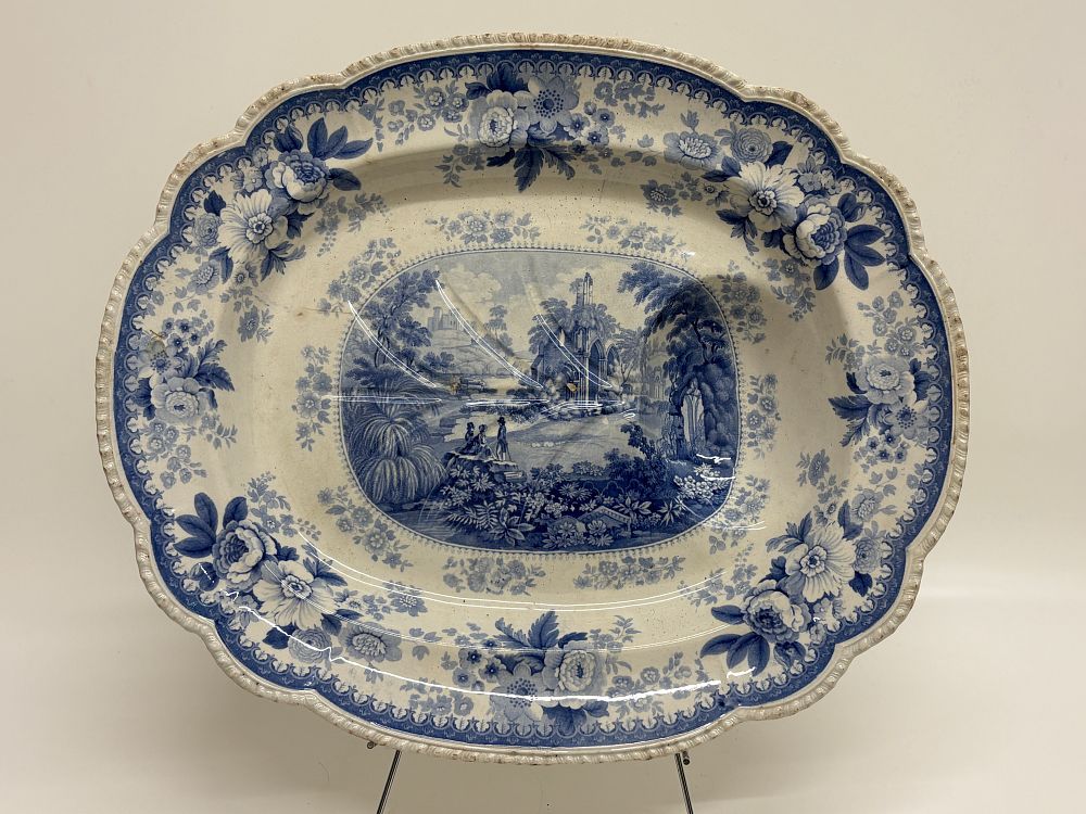 Lot 525: Large Mid-19th Century Staffordshire Blue Transfer-Printed Earthenware Meat Platter in the Ruins Pattern 49x41cm