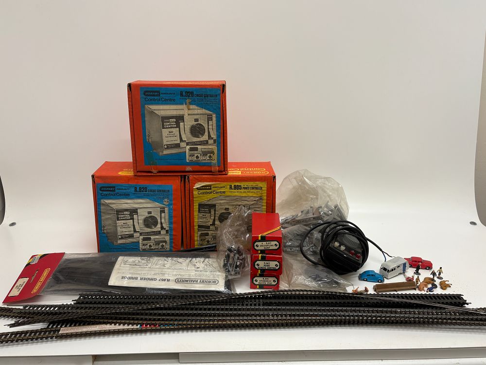 Lot 530: A Collection of Hornby Railways OO Gauge Controllers, Track, and Scenic Accessories