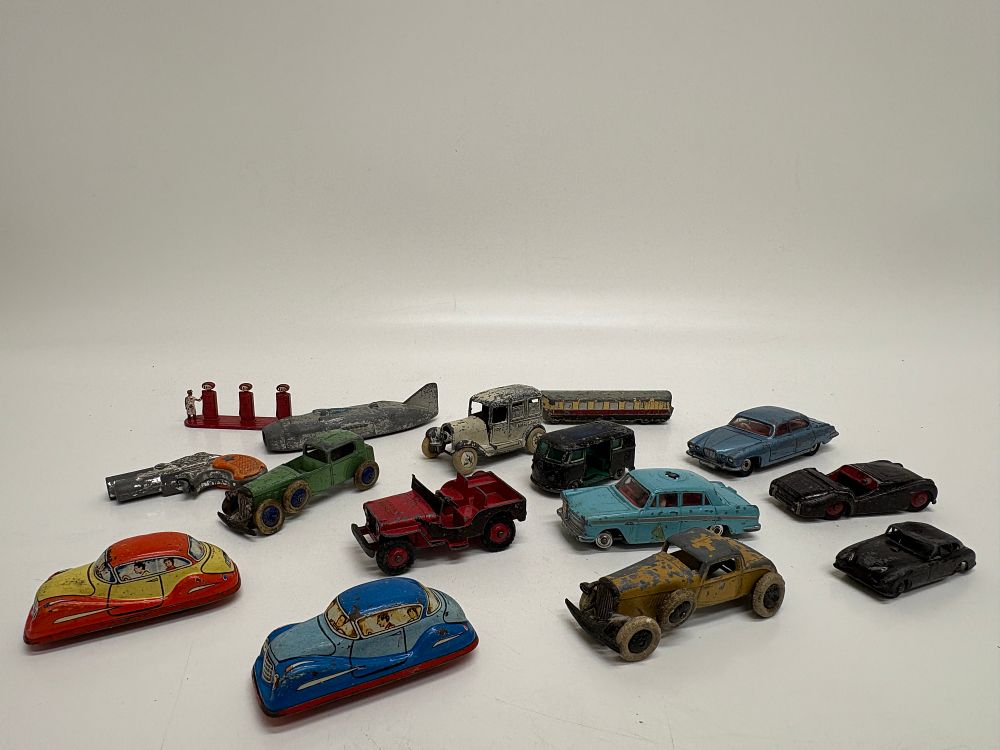 Lot 533: A Collection of Vintage Dinky Toys and Tinplate Model Vehicles