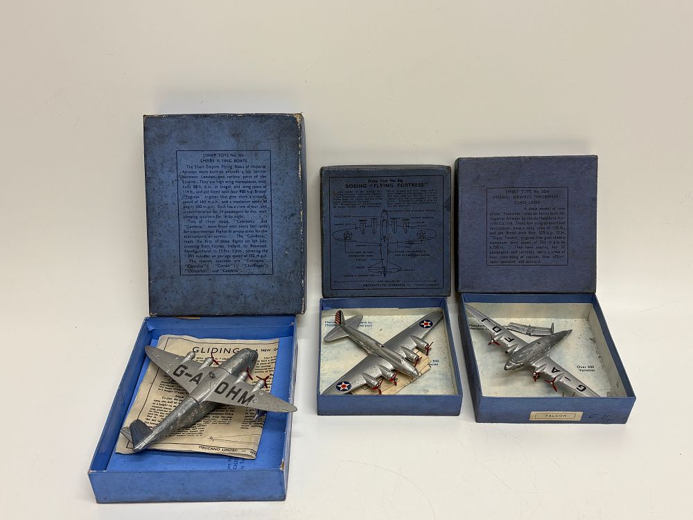 Lot 538: Three Dinky Toys Pre-War Die-Cast Model Aeroplanes with Original Technical Boxes