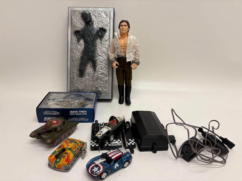 Lot 546: An Assortment of Star Wars, Star Trek, and Vintage Tinplate Toys including Carrera Slot Car Components