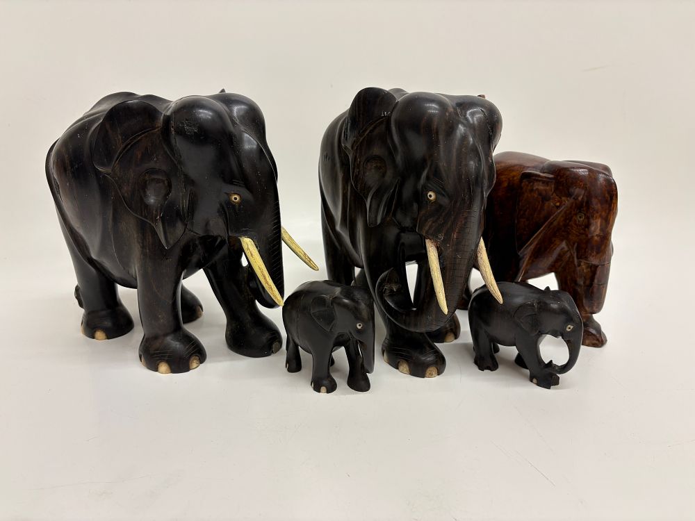 Lot 549: A Group of Five Hand Carved Wooden Elephant Figurines