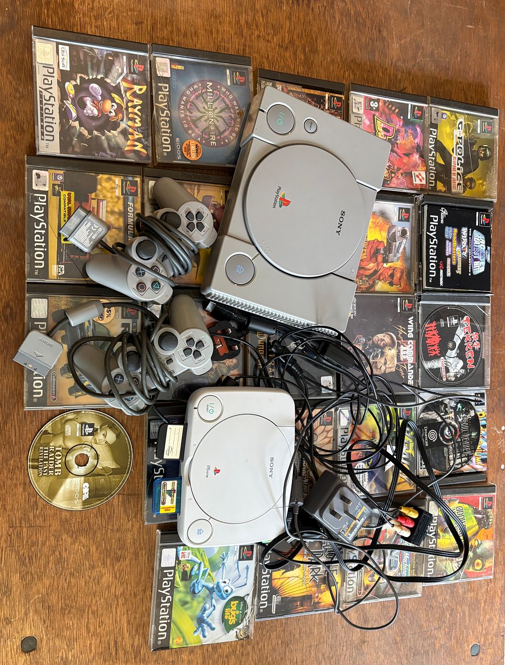 Lot 550: An Assortment of Sony PlayStation and PS one Consoles, Controllers and Games