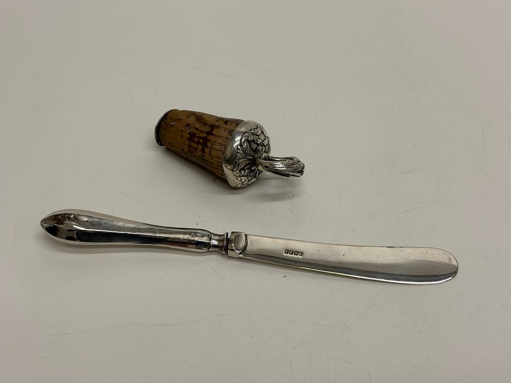 Lot 64: Hallmarked Sterling Silver Mounted Bottle Stopper and a Silver Handled Butter Knife circa 30g net