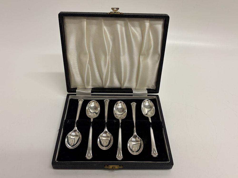 Lot 69: A set of six sterling silver teaspoons in a fitted case circa 70g