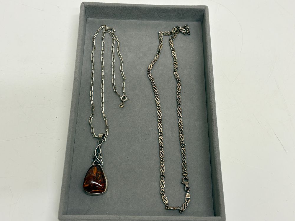 Lot 75: Two Sterling Silver and White Metal Necklaces Including Large Baltic Amber Pendant