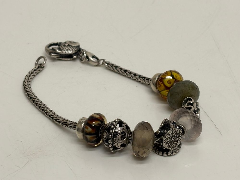 Lot 89: A Trollbeads Sterling Silver Foxtail-Link Bracelet with Gemstone and Glass Beads Gross circa 36g