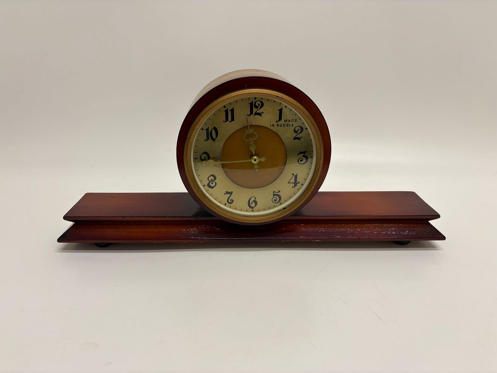 Lot 650: Vesna Russian Mechanical Mantel Clock with Two-Tone Sunburst Case