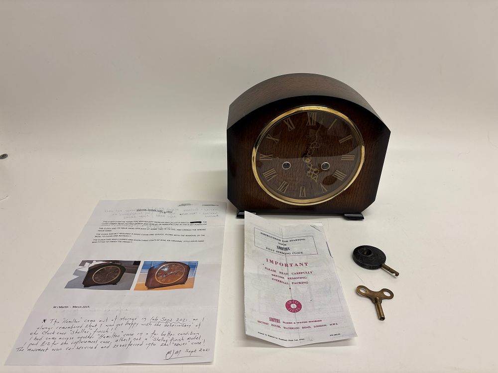 Lot 651: Smiths Enfield Oak-Cased 8-Day Striking Mantel Clock