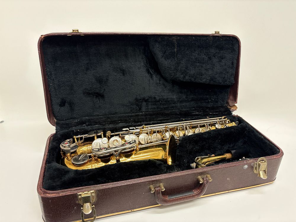 Lot 654: Urhart Alto Saxophone Distributed by Vincent Bach International Ltd with Case