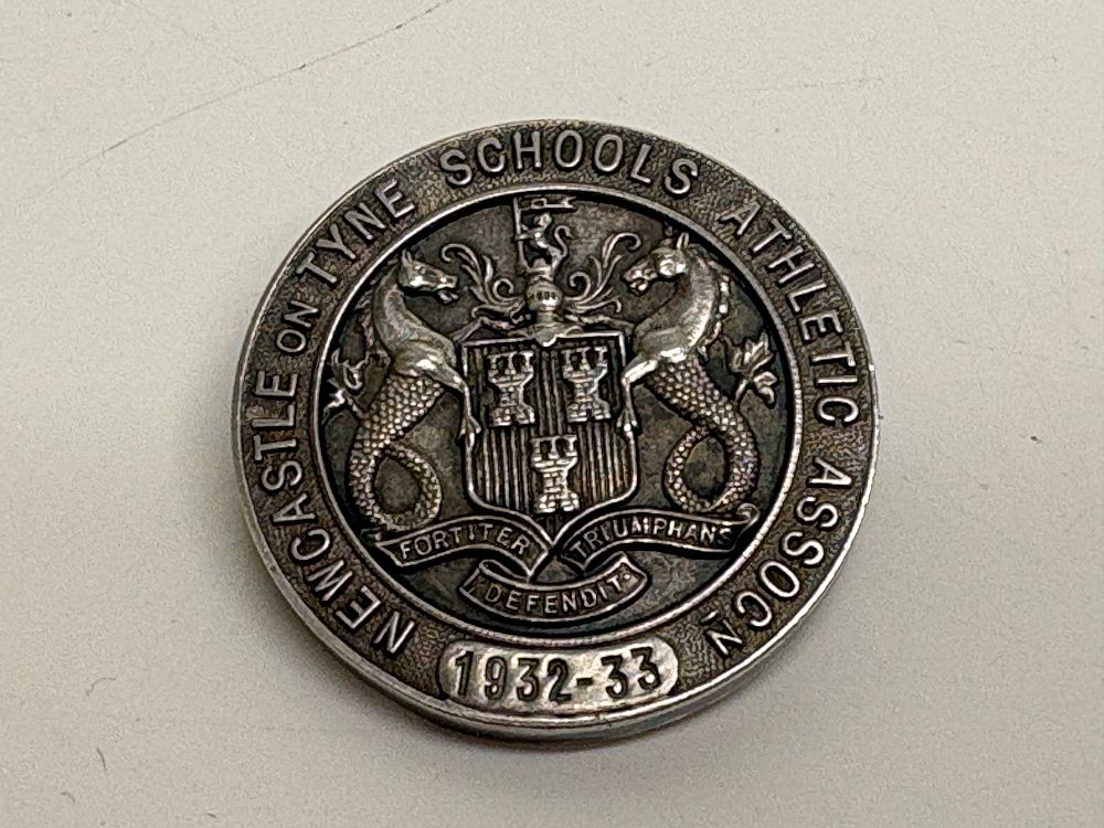 Lot 90: Sterling Silver Newcastle on Tyne Schools Athletic Association Medal Pin 1932-33 circa 14.5g