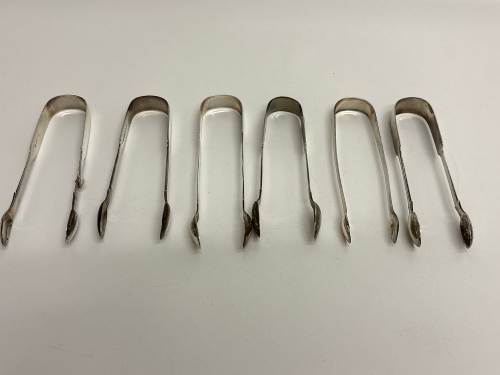 Lot 92: An Assortment of Newcastle Sterling Silver Sugar Tongs circa 224g