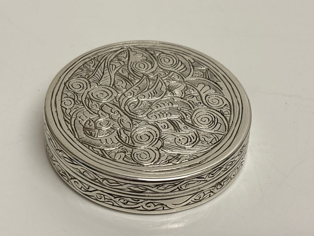 Lot 97: An Egyptian Silver 900 Circular Pill Box with Engraved Islamic Motifs 1942 circa 42g