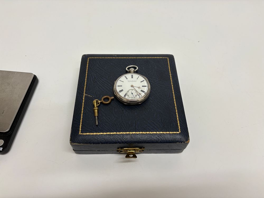 Lot 103: Arnold and Lewis Silver Open Face Pocket Watch with Associated Box and Key gross circa 90g