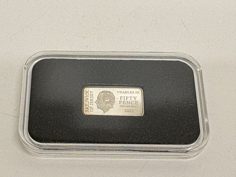 Lot 104: A 2023 Bailiwick of Jersey Charles III Silver Fifty Pence Commemorative Ingot