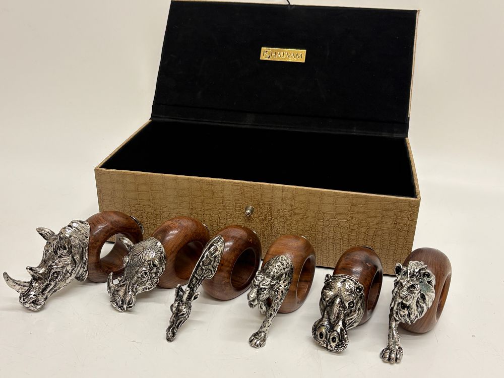 Lot 204: A Collection of Ishatvam White Metal and Wood African Safari Animal Napkin Rings