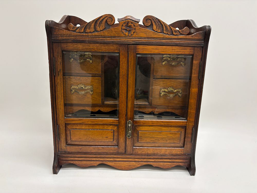 Lot 639: Antique Edwardian Carved Oak Smoker's Cabinet with Hallmarked Silver Mounted Jar 41x46x18cm