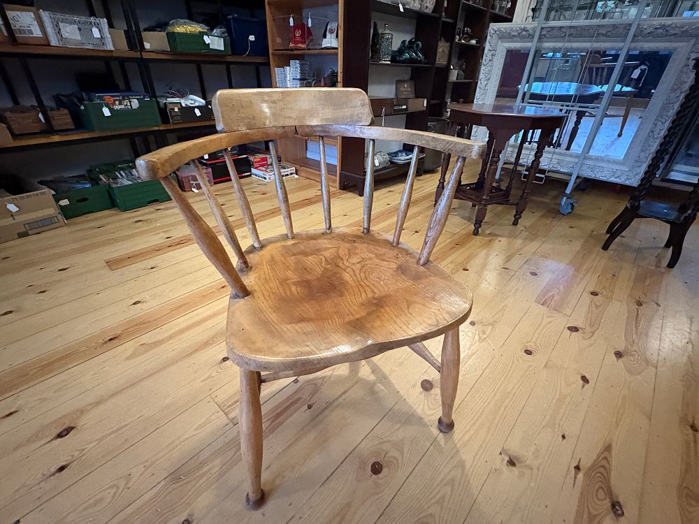 Lot 672: An Antique Stained Ash and Elm Smoker's Bow Captain's Chair