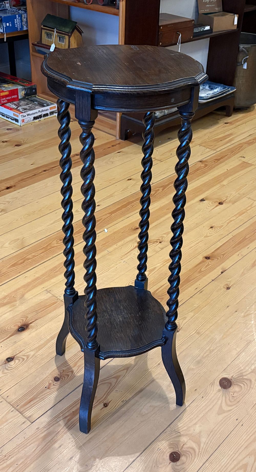 Lot 674: An Antique Dark Stained Oak Barley Twist Plant Stand