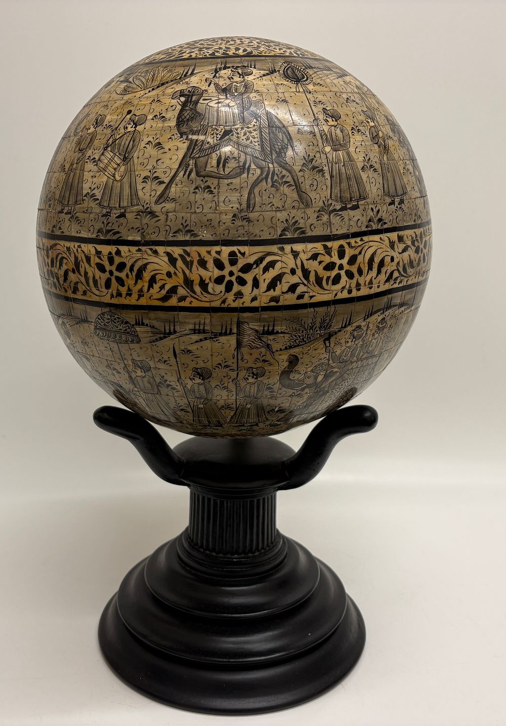 Lot 676: A Decorative Hand Painted Camel Bone Tile Orb on Stand