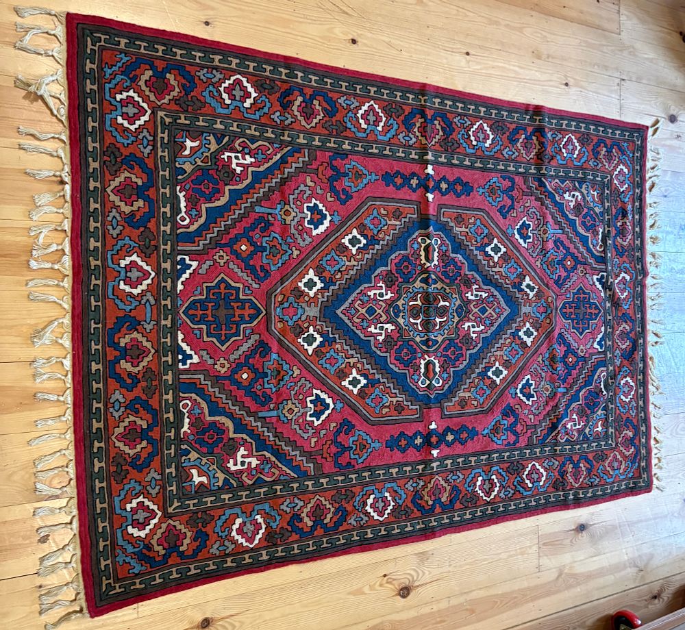 Lot 677: An Embroidered Textile Panel with Geometric Lozenge Medallion