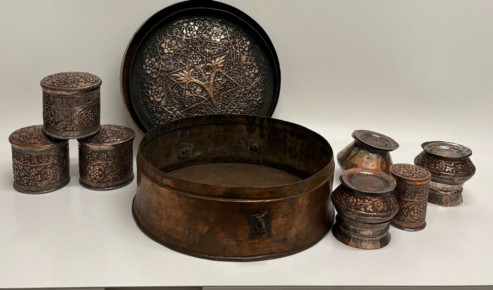 Lot 679: A Group of Indian Hammered Copper Pandan Boxes and Vessels