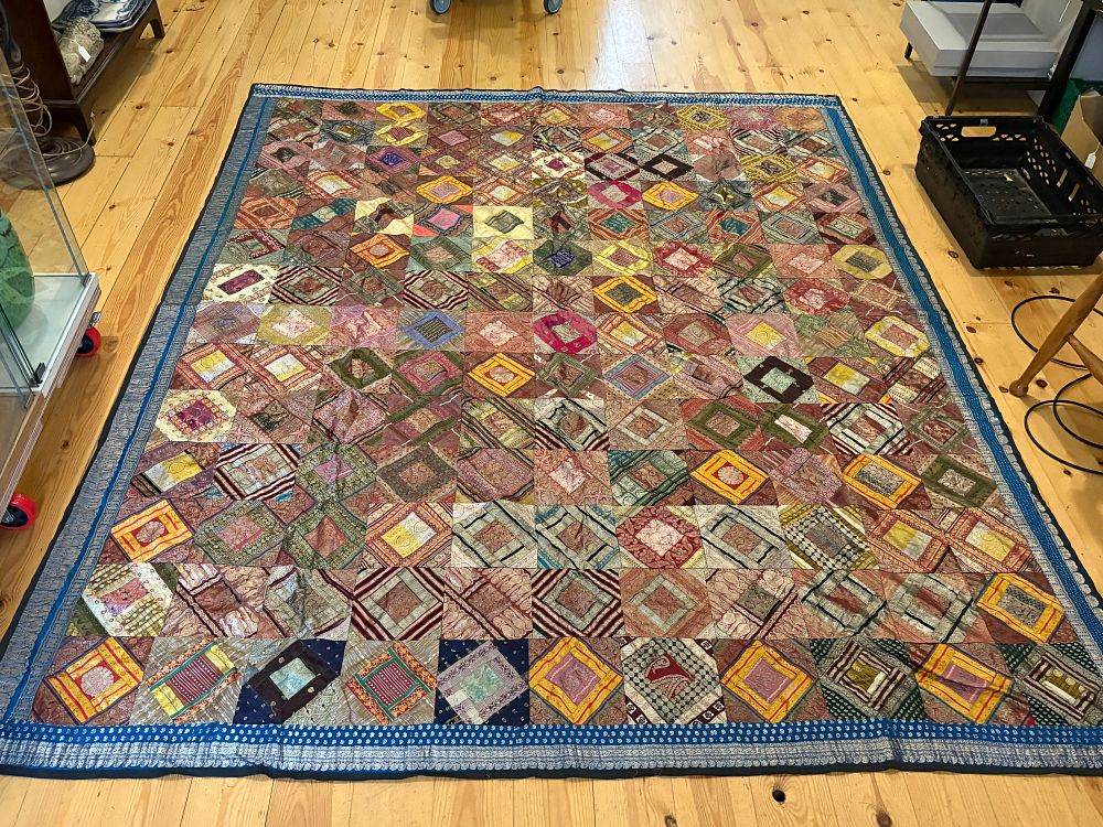 Lot 680: An Indian Silk and Metallic Thread Brocaded Patchwork Textile 222x263cm