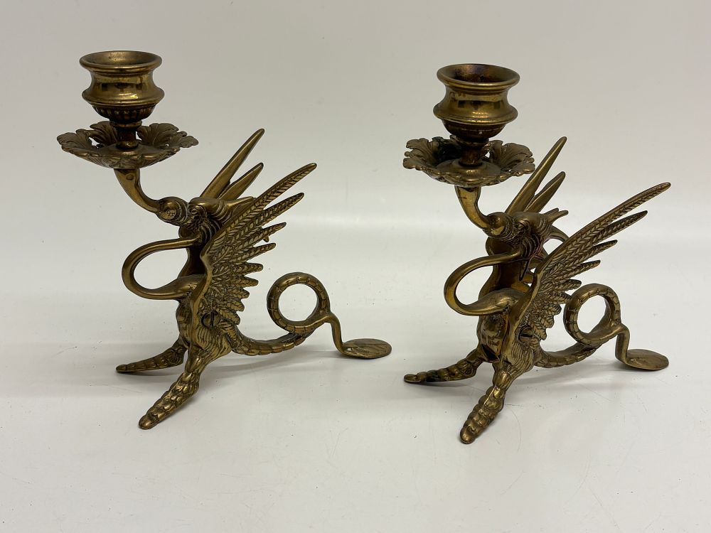 Lot 683: A Pair of Renaissance Revival Brass Winged Dragon Candlesticks