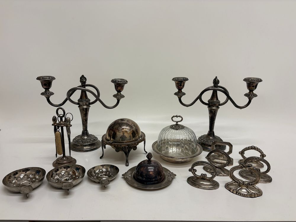 Lot 687: A Collection of Silver-Plated Tablewares and Vanity Accessories including Candelabra and Wine Tasters