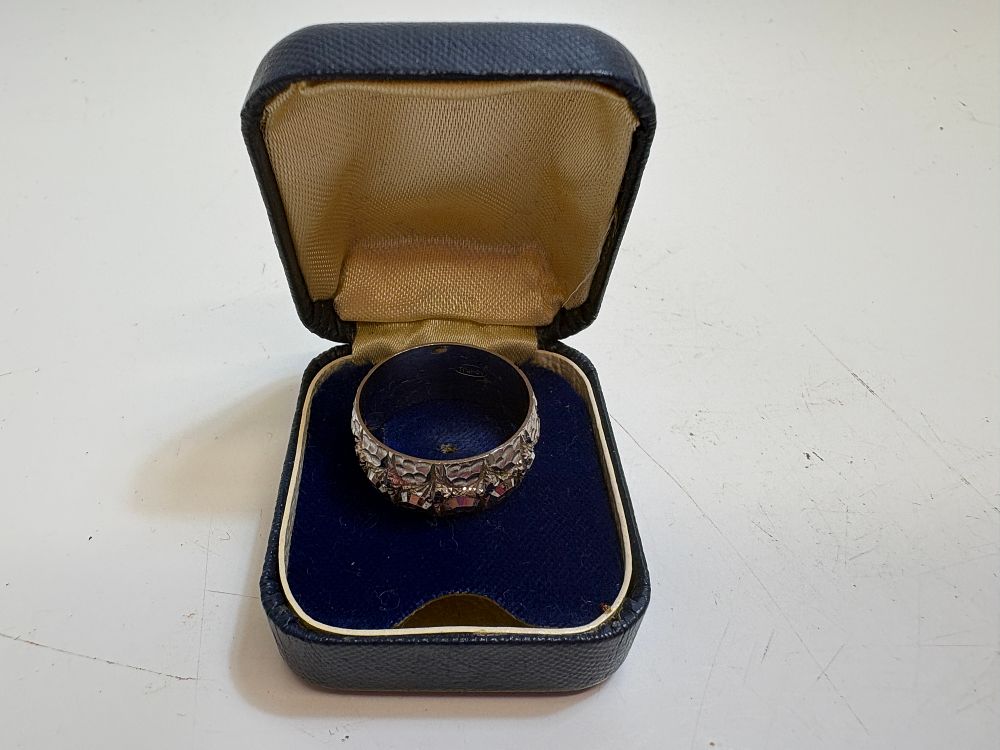 Lot 12: A 1970s 9 Carat White Gold Textured Brutalist Band Ring circa 5.9g Size Q