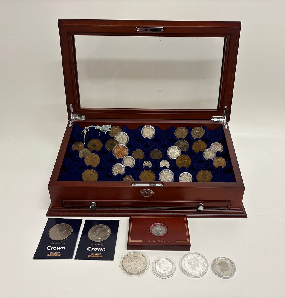 Lot 615: A Collection of UK and Commonwealth Coins in a Mahogany Finished Display Case