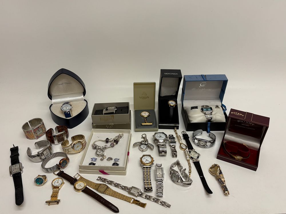 Lot 622: A Collection of Approximately 24 Quartz Fashion Watches and Costume Jewellery