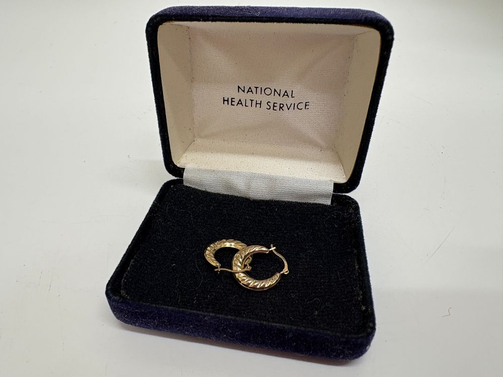 Lot 34: A Pair of Israeli 9ct gold Textured Hoop Earrings Gross Circa 0.5g