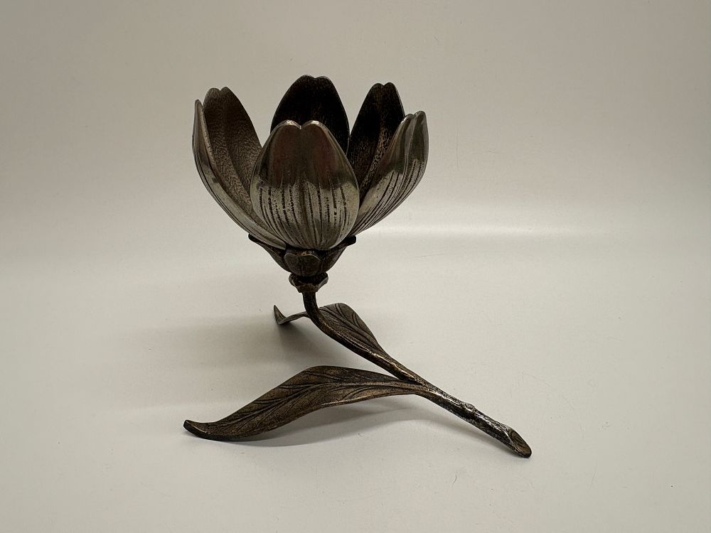 Lot 734: A Mid-Century Modern cast metal lotus flower modular candle holder and ashtray set
