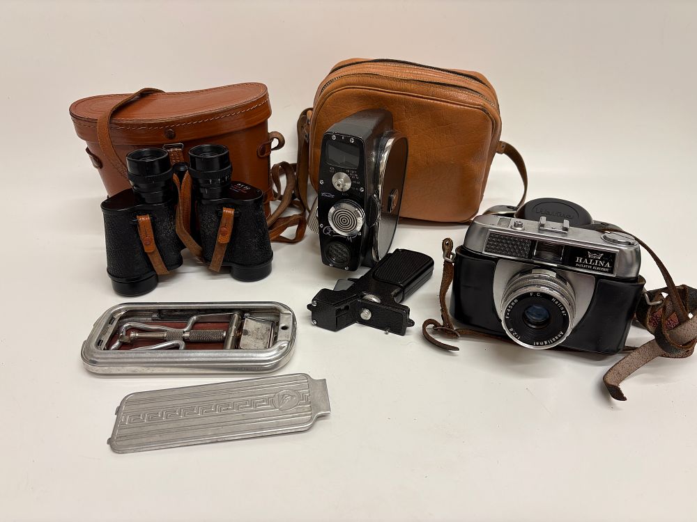 Lot 735: A Collection of Mid-Century Optical and Photographic Equipment including a Halina Paulette Electric Camera and Binoculars