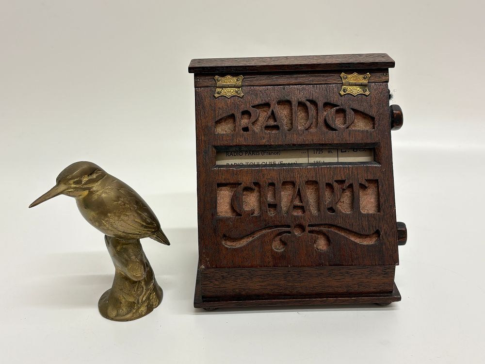 Lot 738: An Antique Scroll Radio Station Index and a Brass Kingfisher Figurine