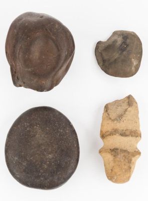 Native American Stone Artifacts. 4 items including large mortar stone, flat round nutting stone