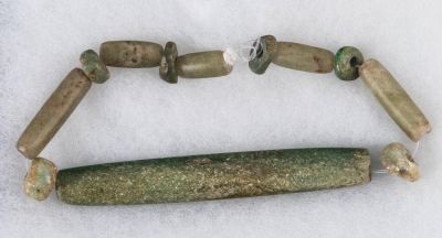 Pre-Columbian Jade Beads (12). All ancient and biconically drilled from Guatemala. The long jade