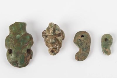 Pre-Columbian Jade Pendants. Pre-Columbian Guatemalan green jade pendants in the shape of