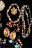 Stone, Rhinestone, & Coral Jewelry. 26 pieces of costume jewelry featuring a 32" polished stone Image - 1