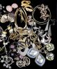 Earrings & More Earrings. Over 40 pair of pierced earrings featuring a pair of iridescent Image - 1
